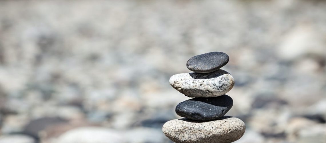 Zen balanced stones stack balance peace silence concept